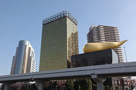 Asahi Beer Hall ad Asakusa, Tokyo, con la Flamme d'Or dorata.