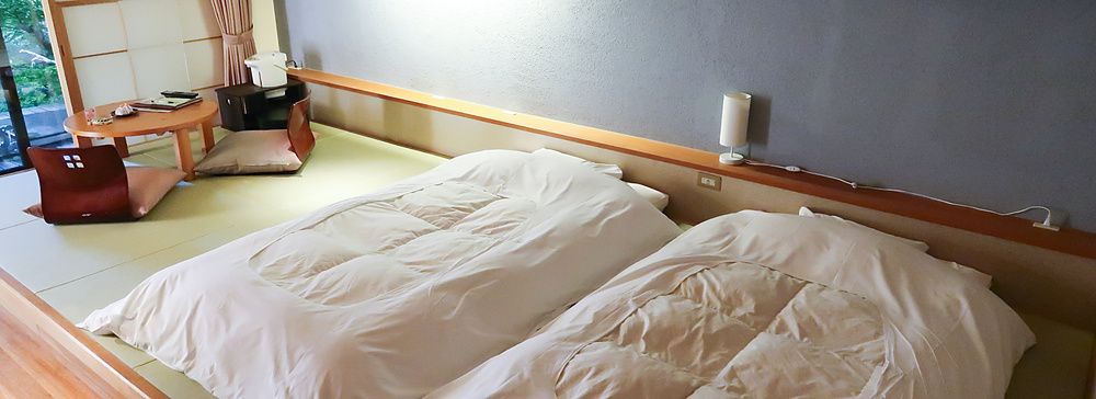 camera con tatami e futon presso Oku Nikko Hotel Shikisai.