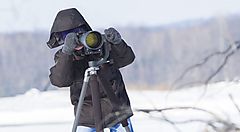 Un fotografo sulla neve.