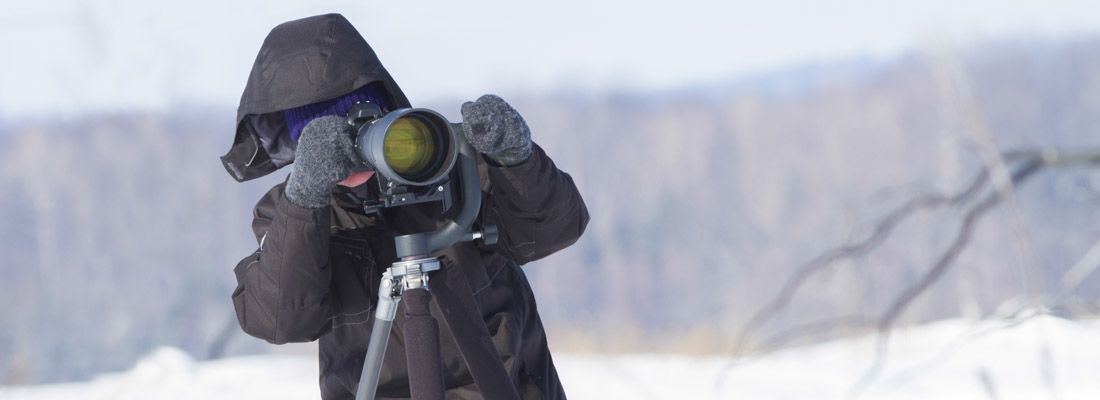 Un fotografo sulla neve.