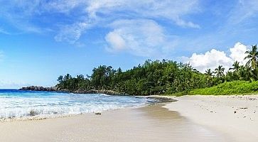 panorama of tropical beach.palms,granite rocks and turquoise water,seychelles 2