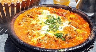 Morocco national dish - tajine of meet with vegetables and meatballs