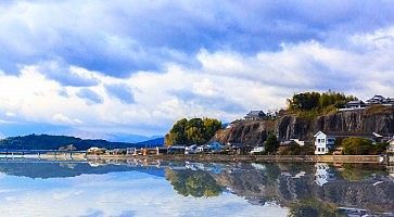 Kitsuki, Oita prefecture, Japan-12 Jan: The reflex of Kitsuki town on an ocean in Japan, 12 Jan 2016