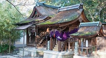 KYOTO, JAPAN - Jan 11 2015: Munakata Shrine of Kyoto Gyoen Garden. a famous historical site in the Ancient city of Kyoto, Japan.