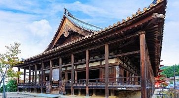 Miyajima, Japan - November 15 2013: Toyokuni Shrine, The wood structure called Senjokaku (Hall of 1000 Tatami) reflecting the largest structure on Miyajima